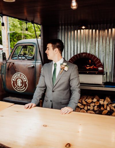 Groom infront of tap truck